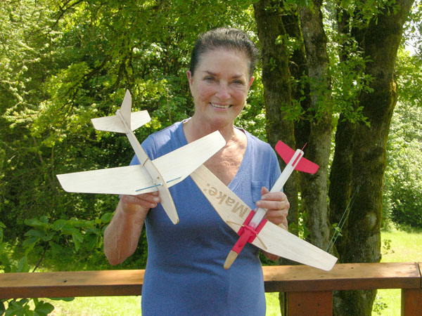 Jim Walker's daughter, Valerie, holding the rocket gliders